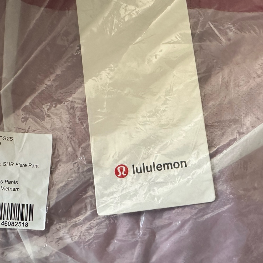 Lululemon NWT SZ 10( color wisteria??) unsure but color code is on tag !